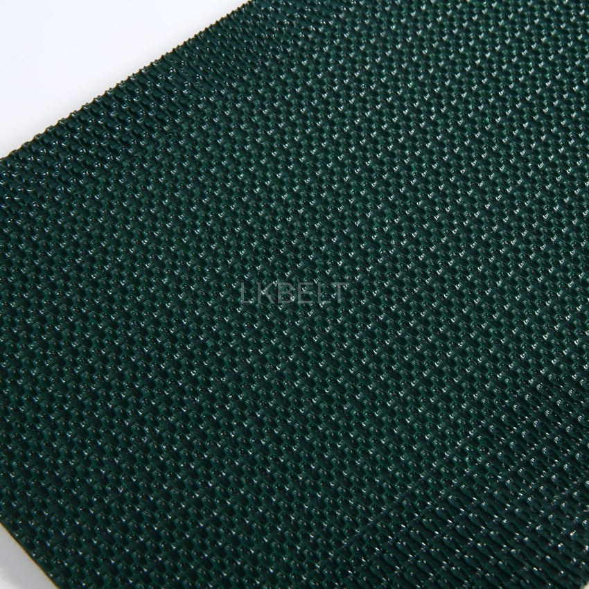 Dark-green raised PVC surface texture