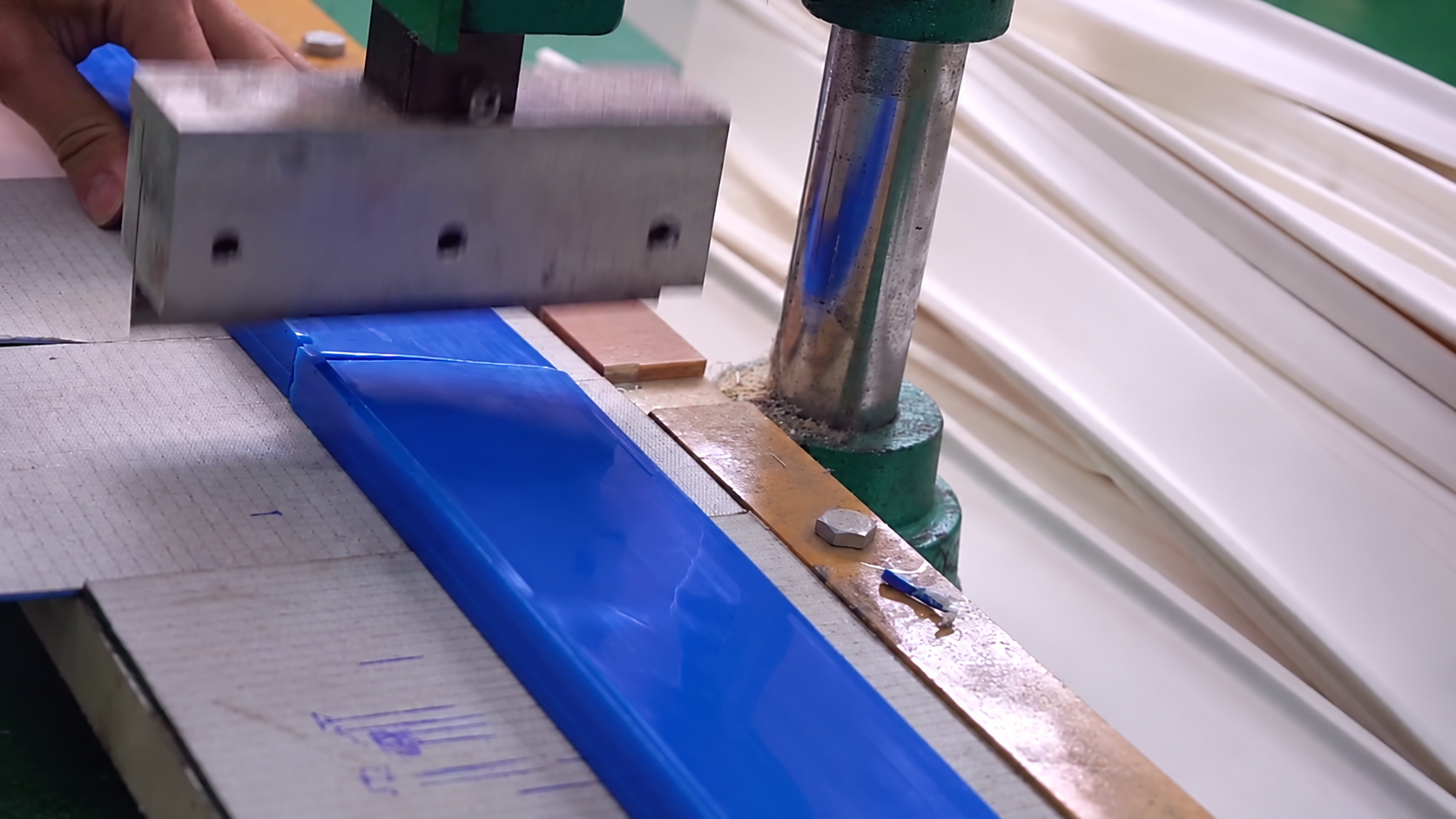 Belt cleat being cut and joined in the LKBELT workshop